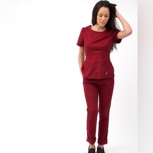 Red Jaanuu peplum top and moto bottoms